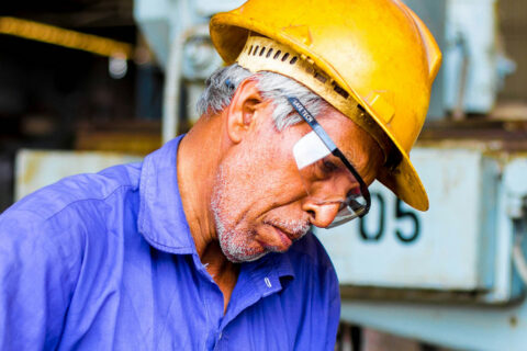 metalworker in a factory setting