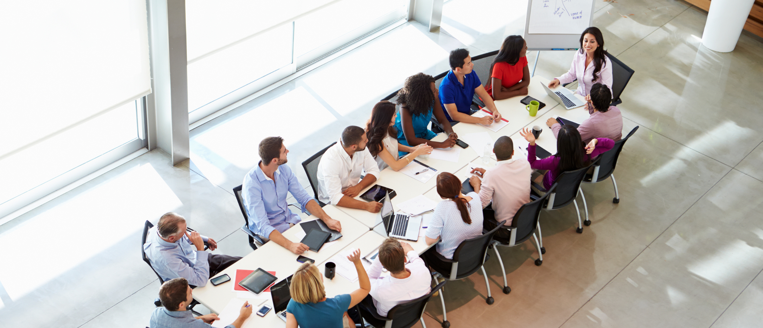 Business woman leading a meeting